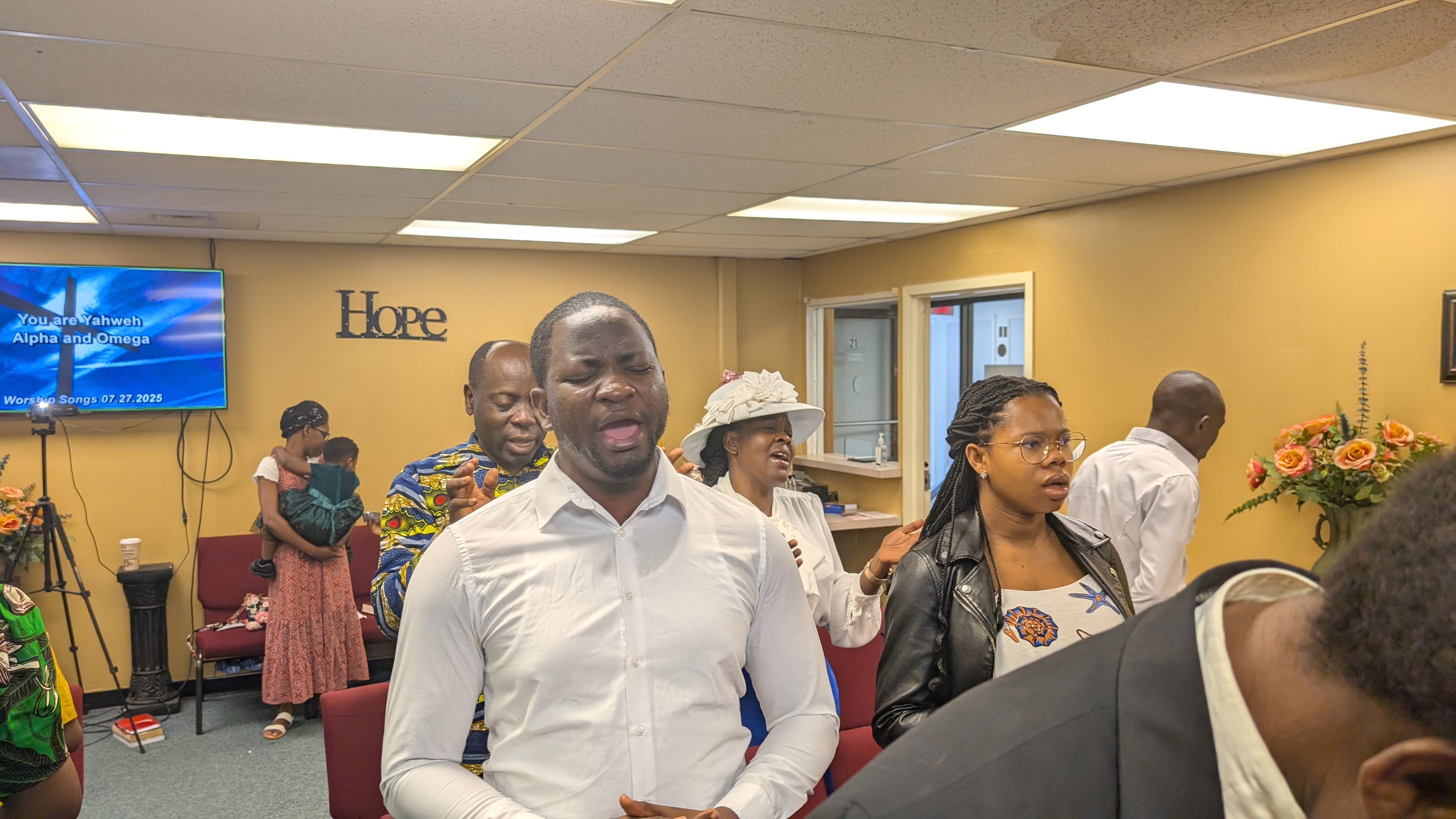 people praying in church